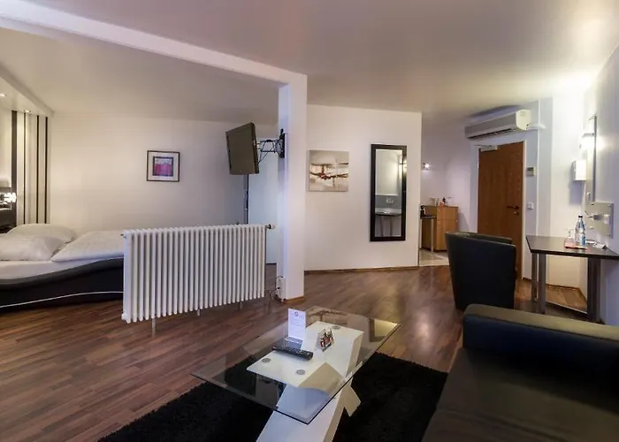 Отель Turmhotel Rhein-main Драйайх